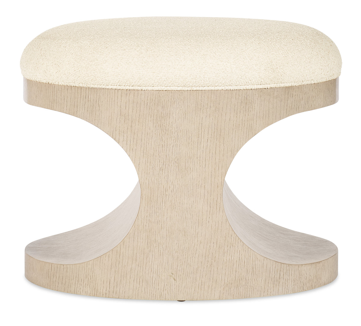 a white round stool with a cushion
