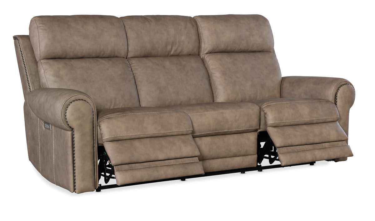 a brown reclining sofa with a white background