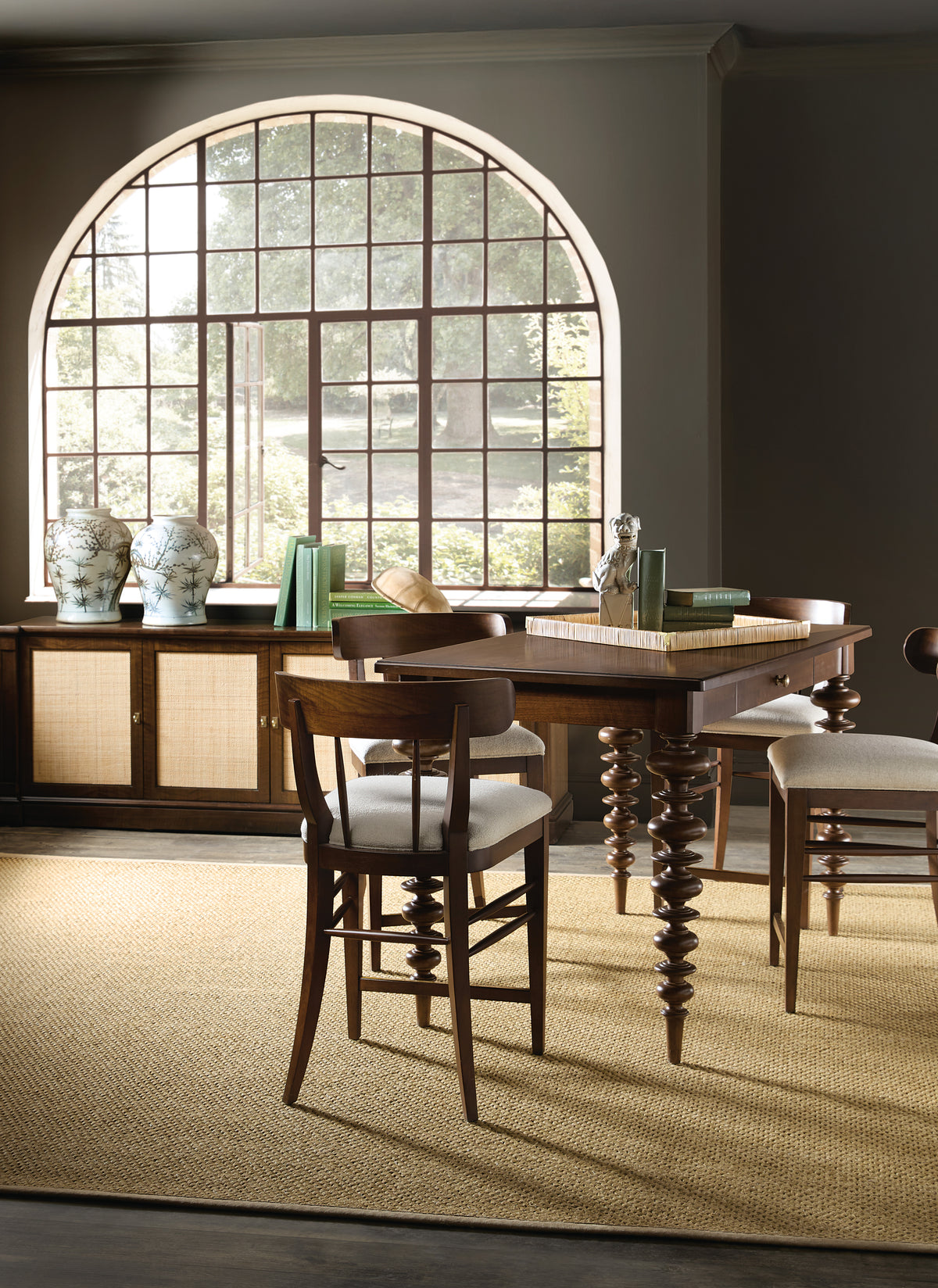 a dining table and chairs in a room