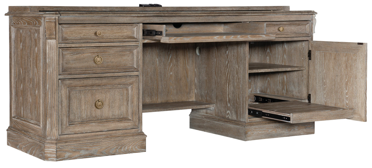 a wooden desk with drawers