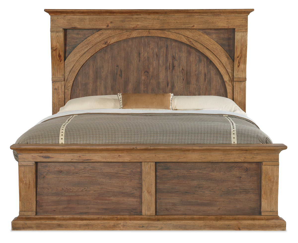 a bed with a wooden headboard