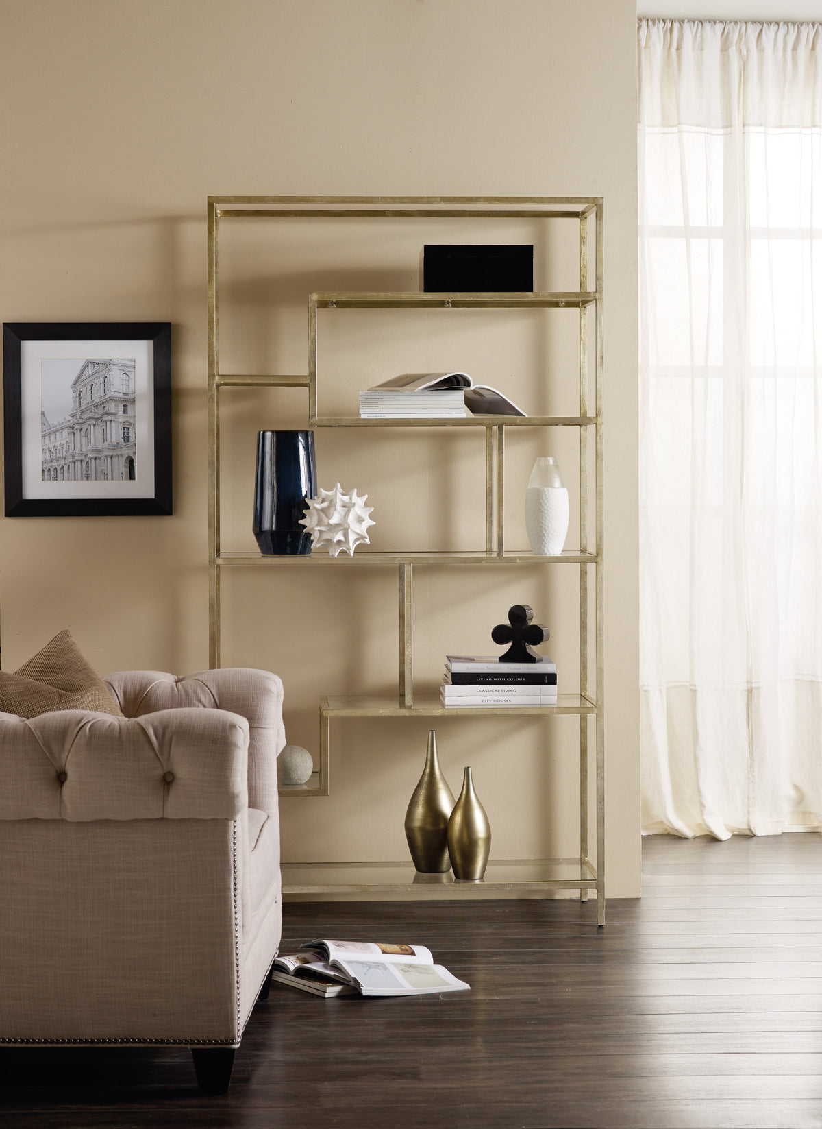 a room with a couch and a shelf