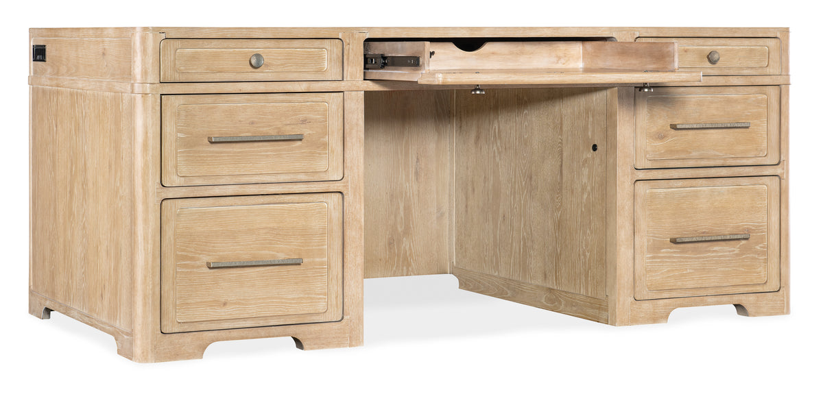 a wooden desk with drawers