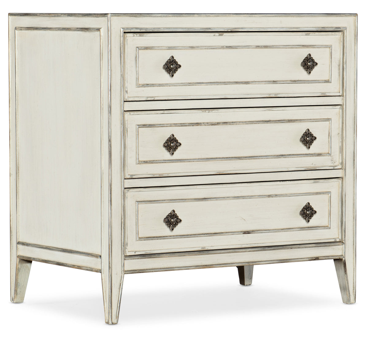 a white dresser with four drawers