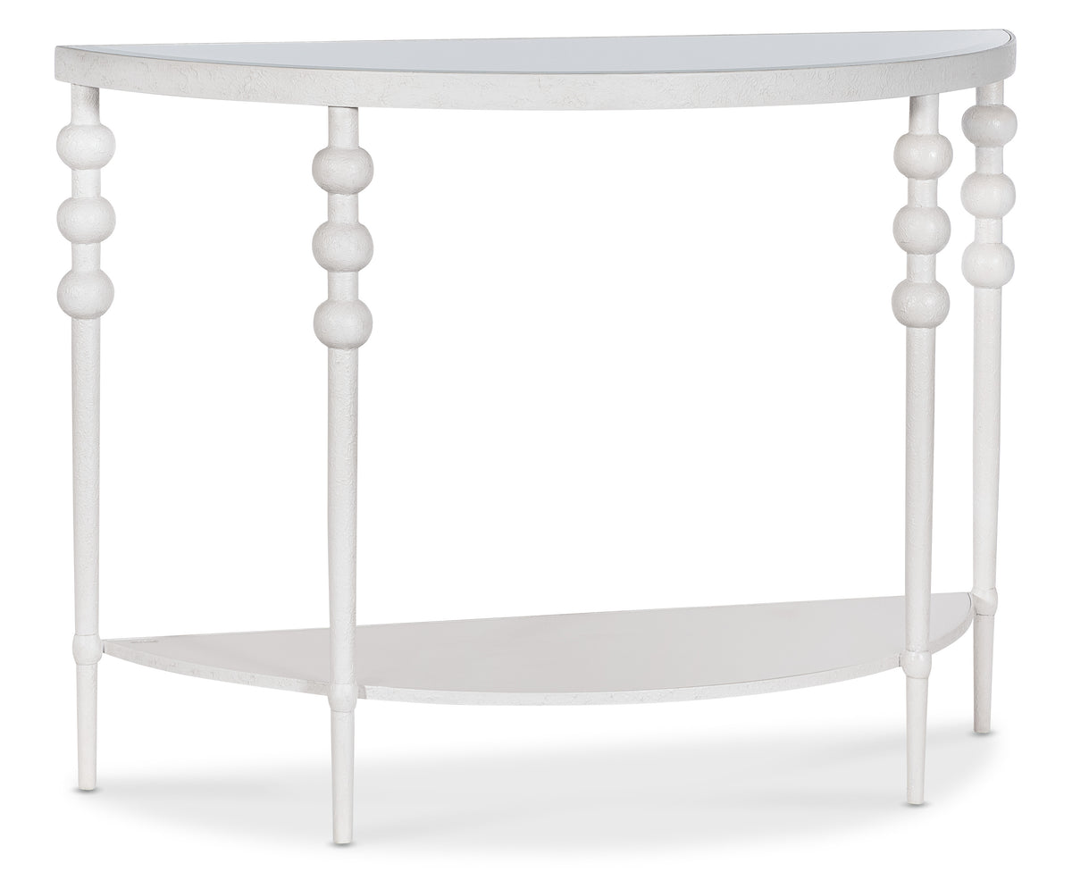 a white table with round legs