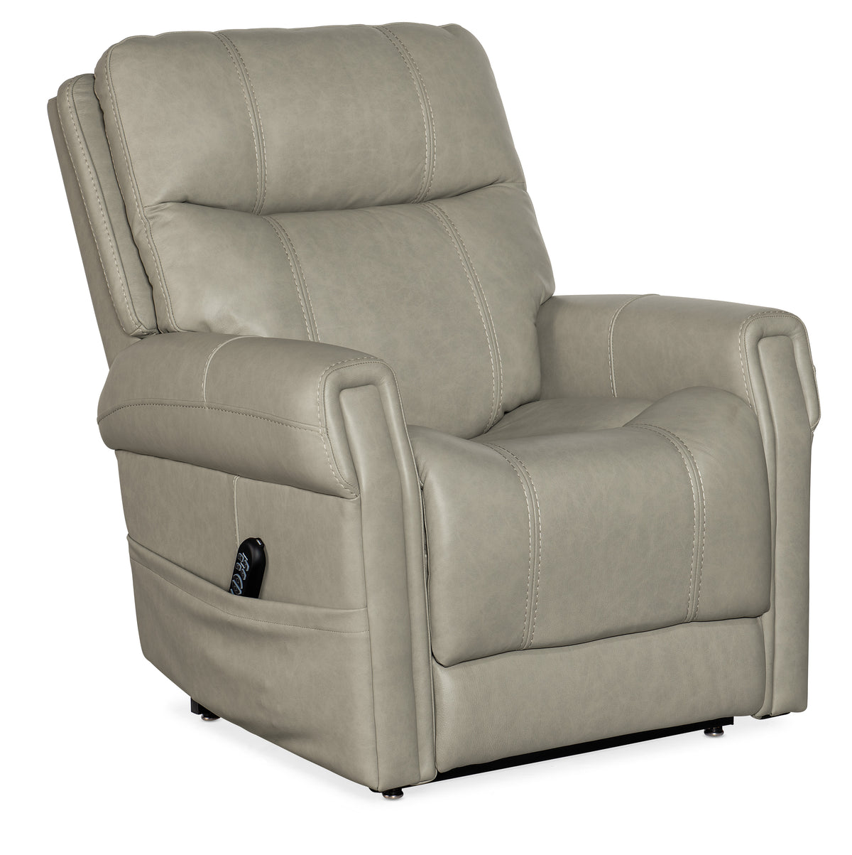 a white recliner with a remote control