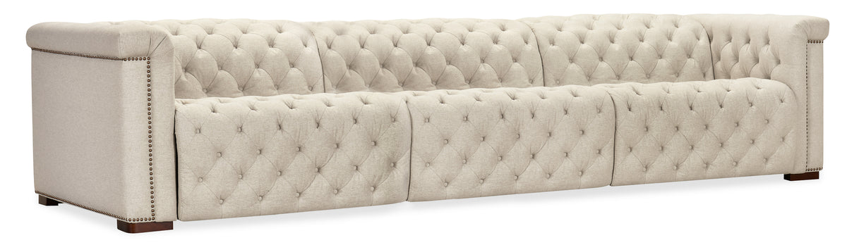 a white couch with buttons