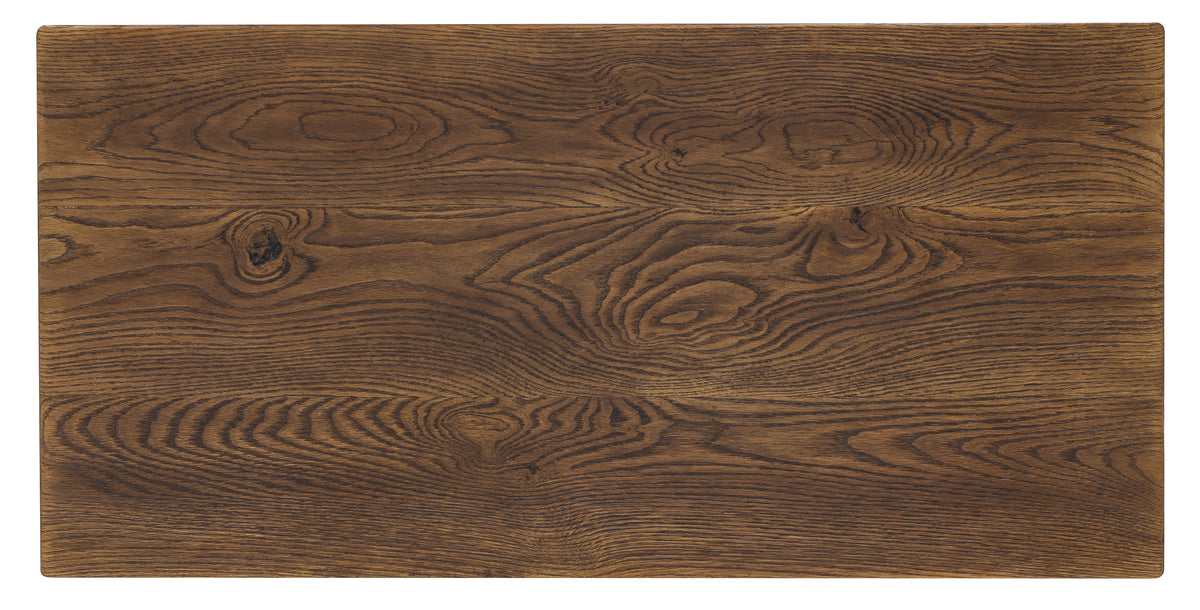 a close up of a wood surface with Nazca Lines in the background