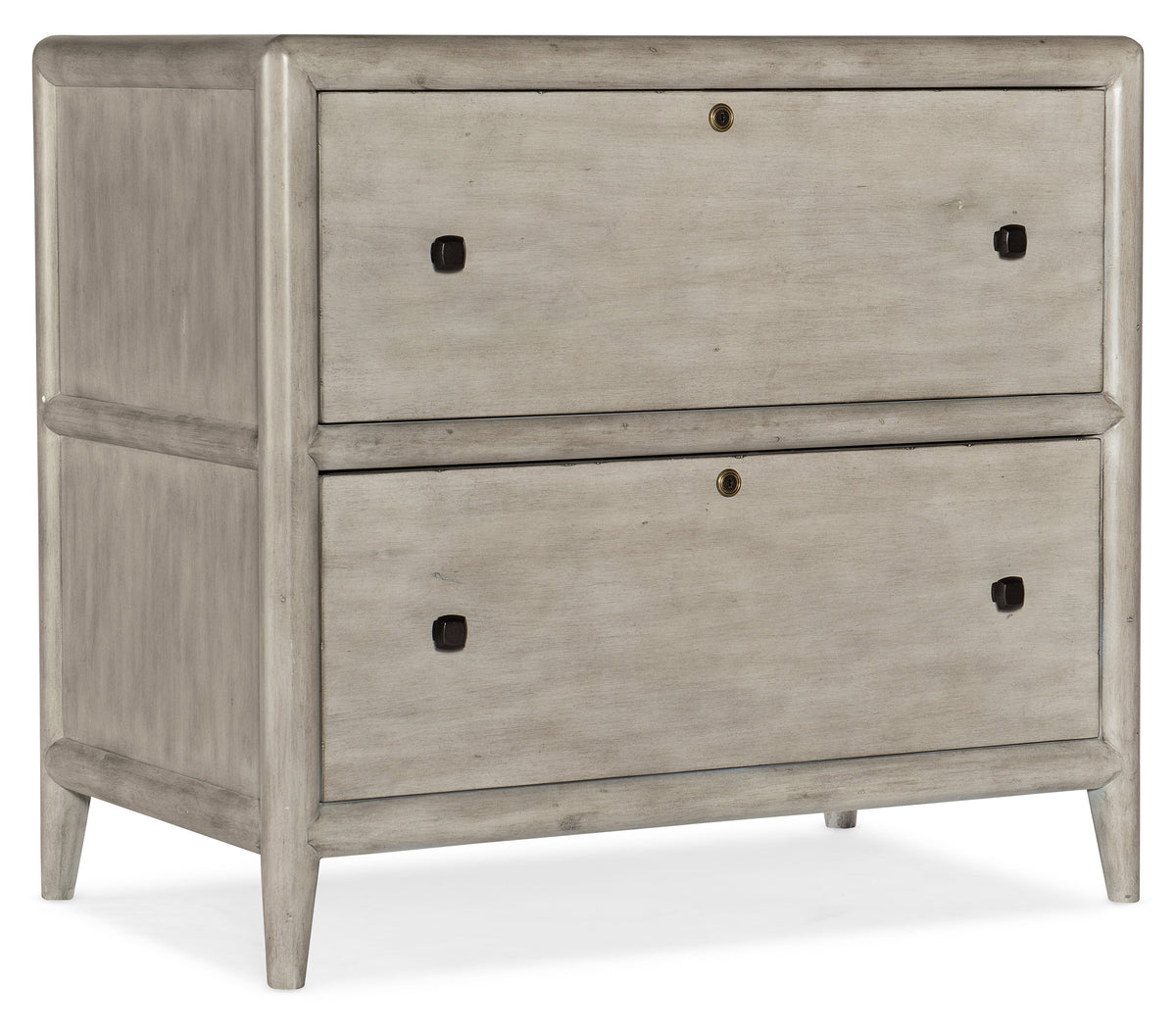 a grey dresser with black knobs