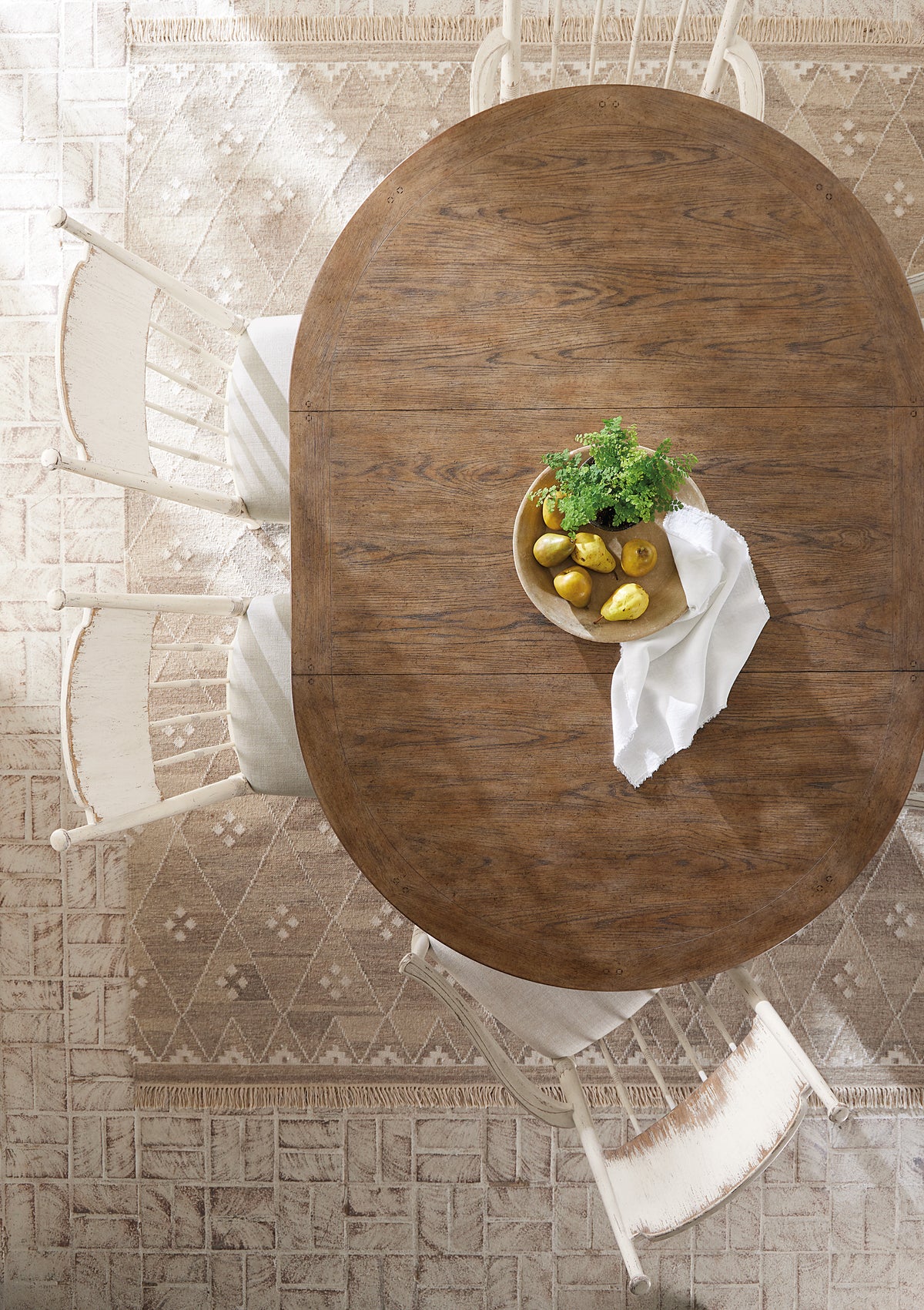 a bowl of fruit on a table