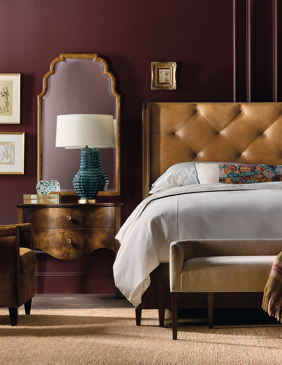 a bedroom with a bed and a mirror