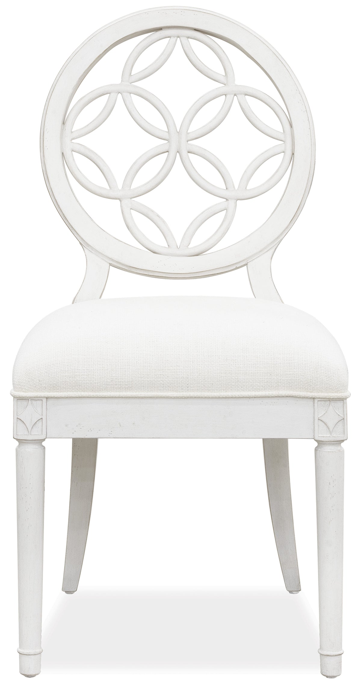 a white chair with a cushion