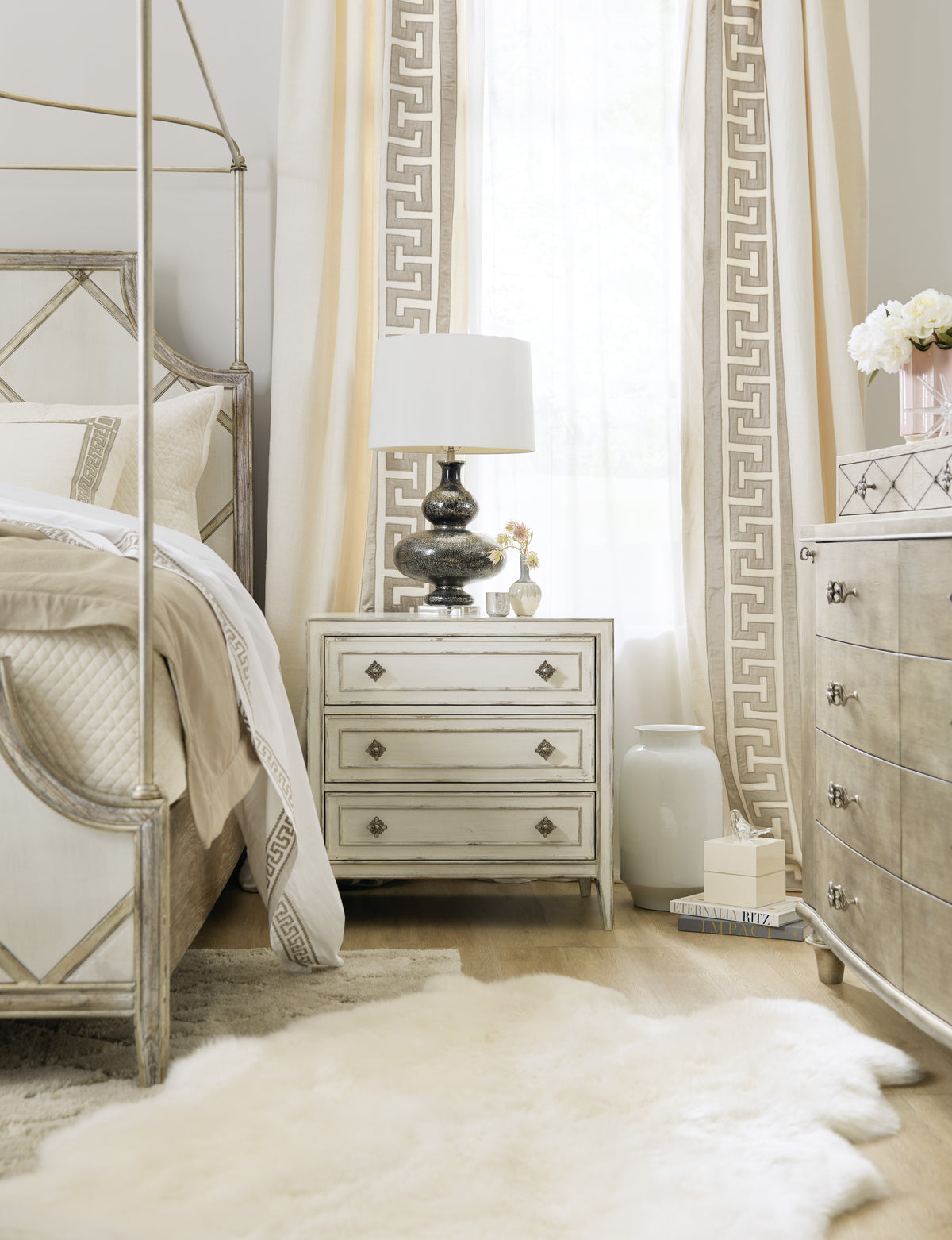 a bedroom with a bed and dresser