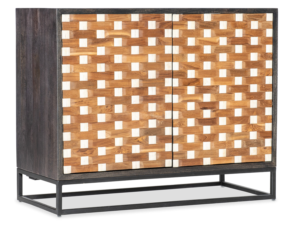 a wooden cabinet with white and brown squares on a metal base