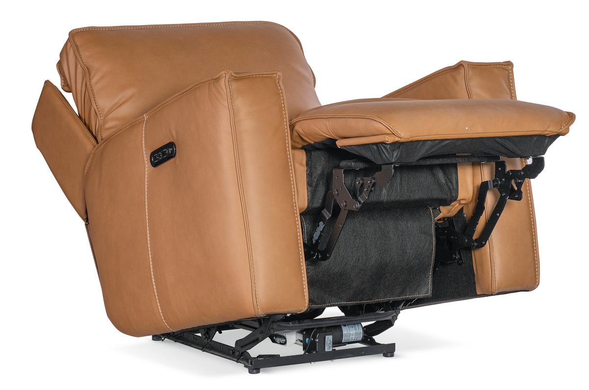 a brown recliner chair with black legs