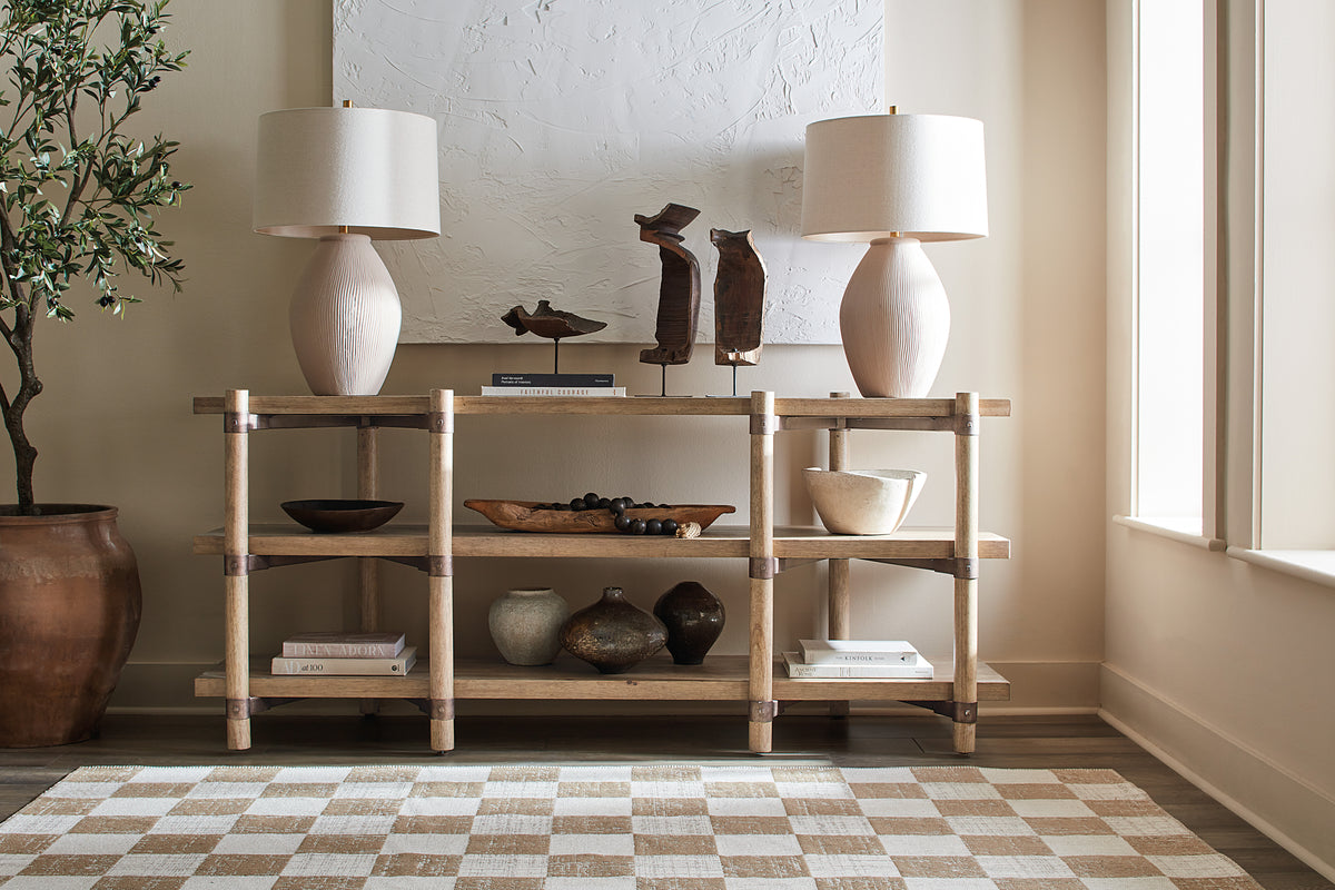 a shelf with lamps and objects on it