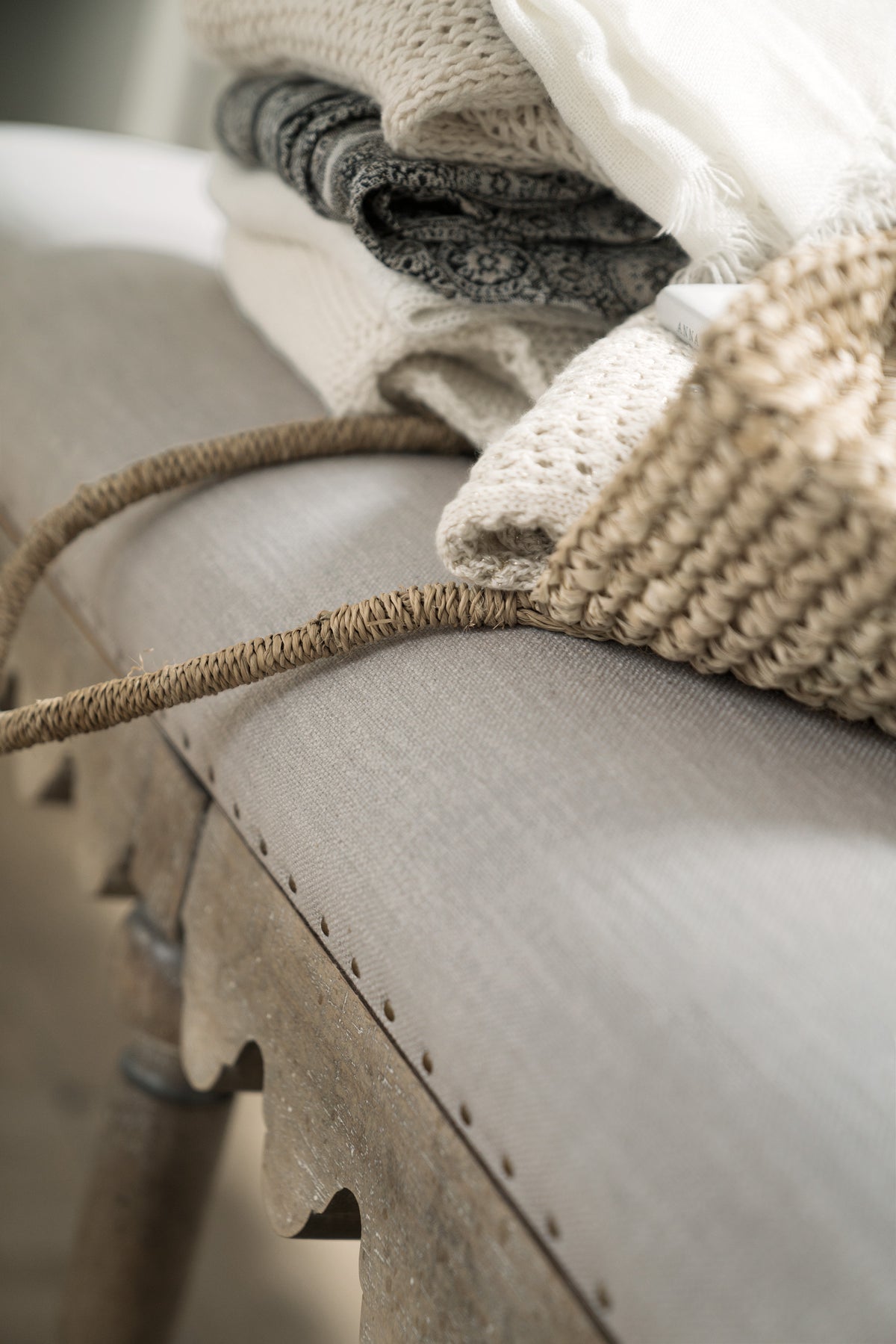 a close up of a bag and knitted clothes