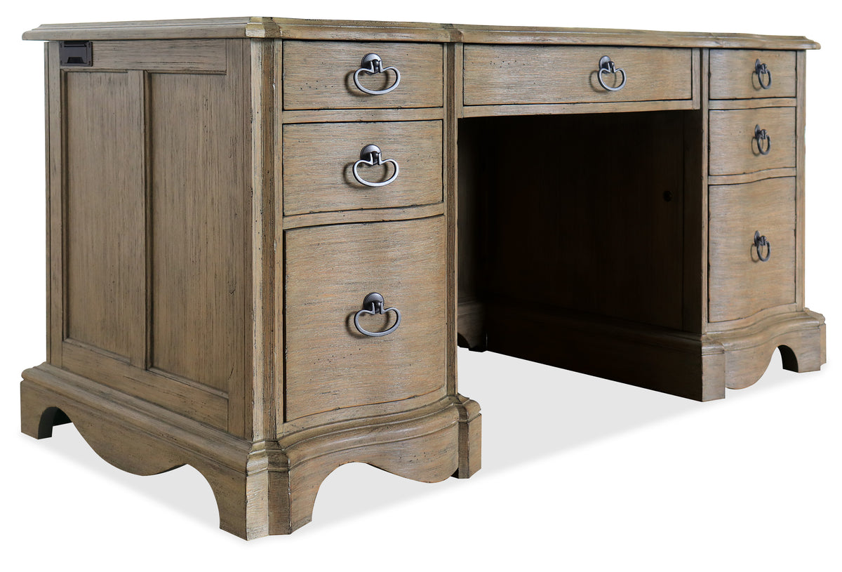 a wooden desk with drawers