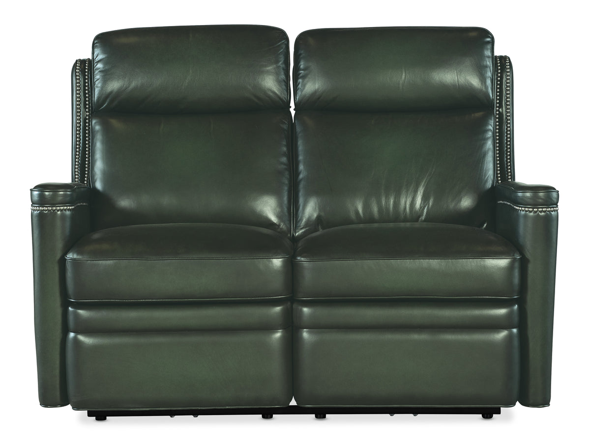 a black leather couch with two recliners