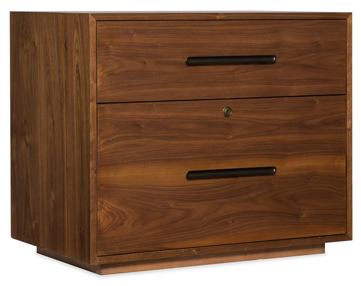 a wooden cabinet with black handles