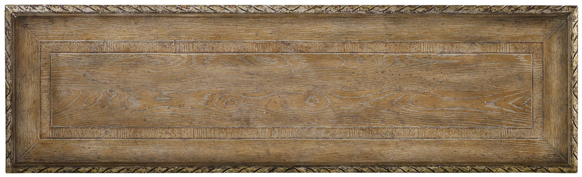 a rectangular wooden board with a gold border