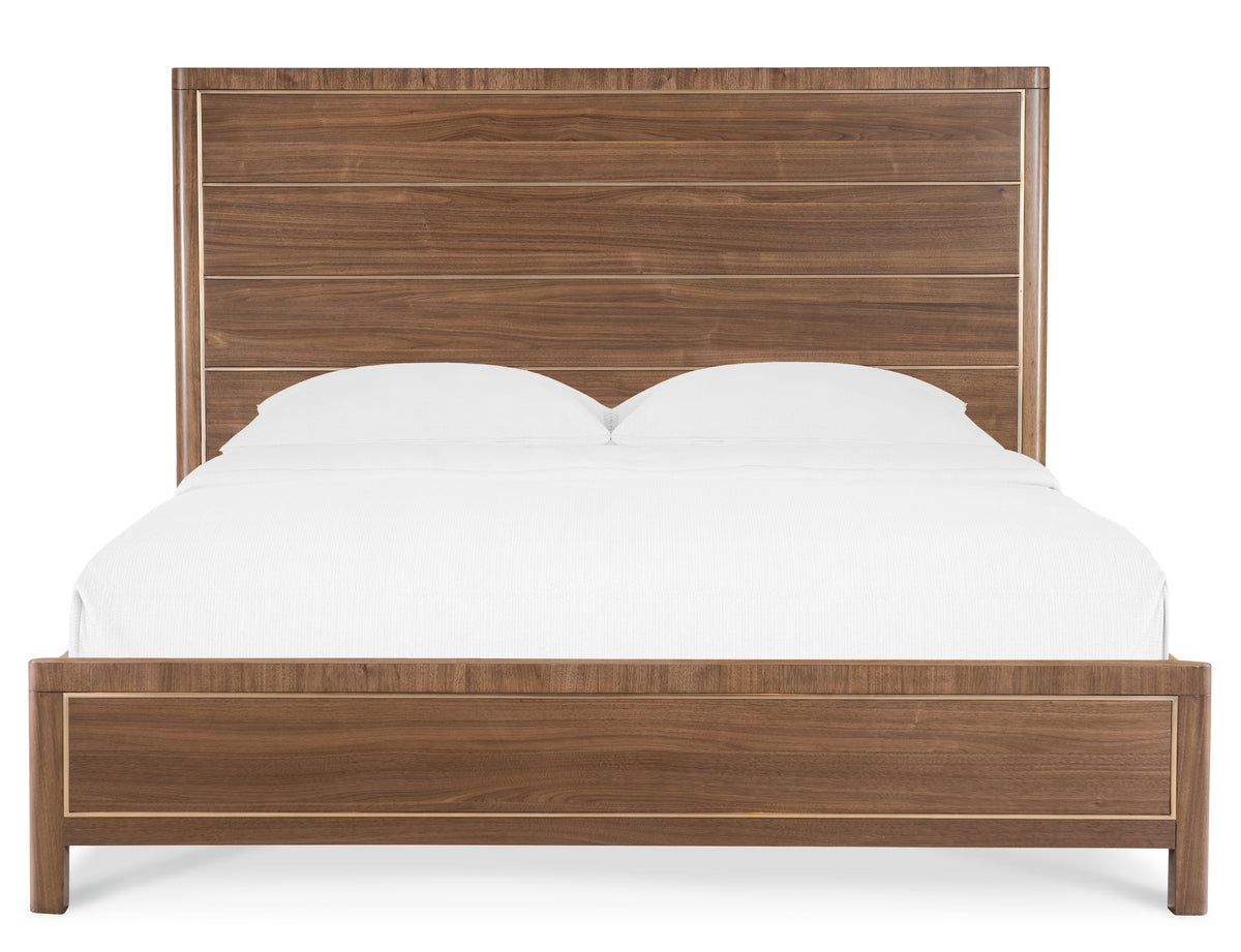 a bed with white sheets and pillows