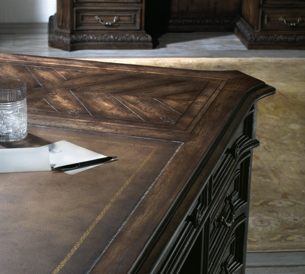 a glass of water on a desk