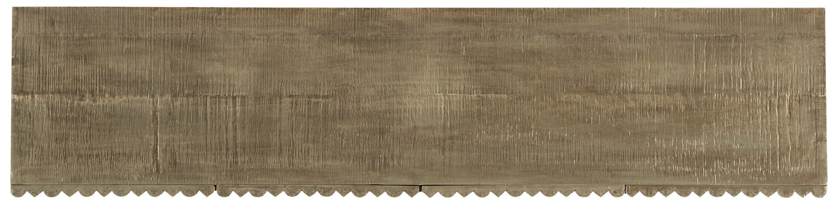 a wooden board with scalloped edges