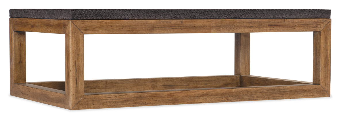 a wooden table with a black top