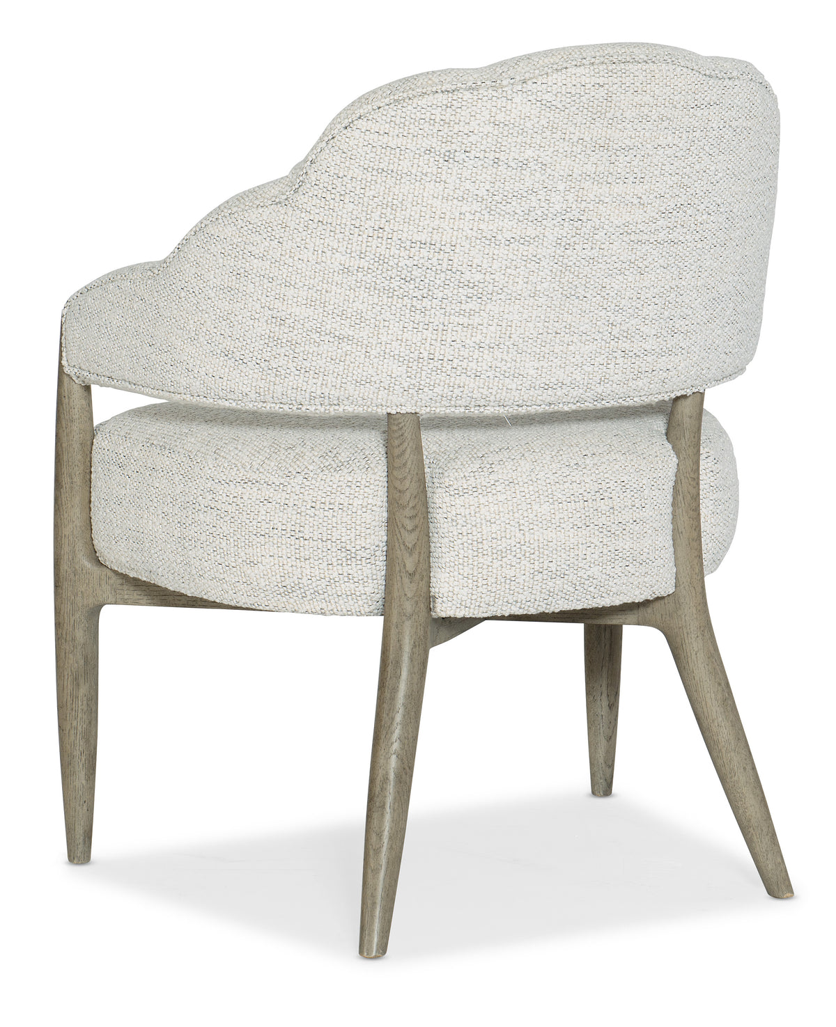 a white chair with wooden legs