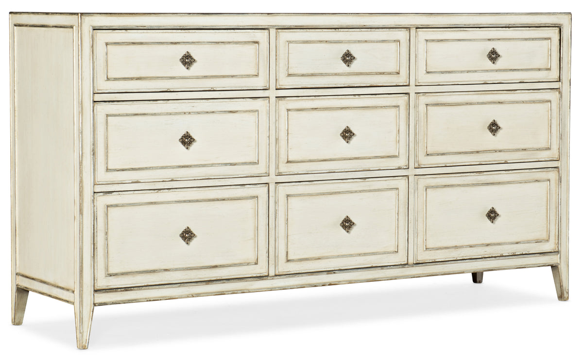 a white dresser with drawers