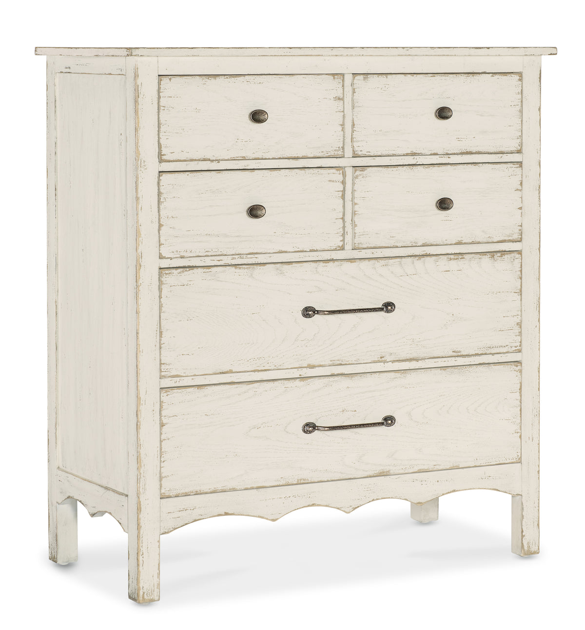 a white dresser with black handles