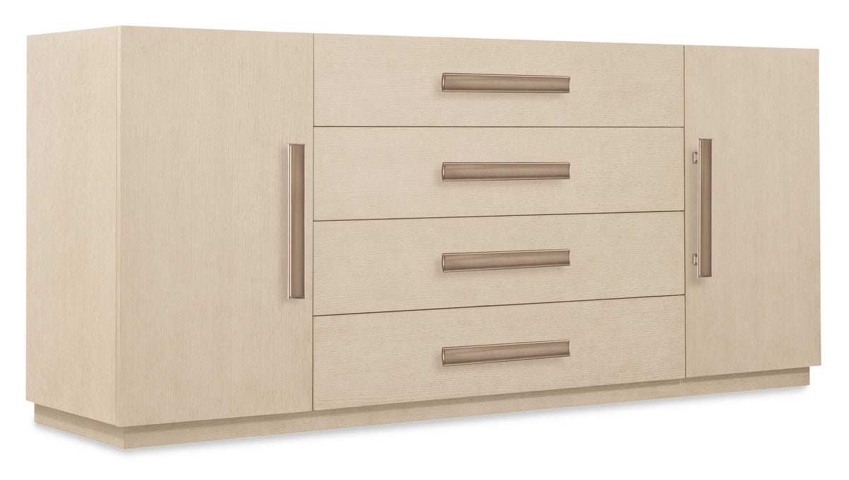 a white dresser with metal handles