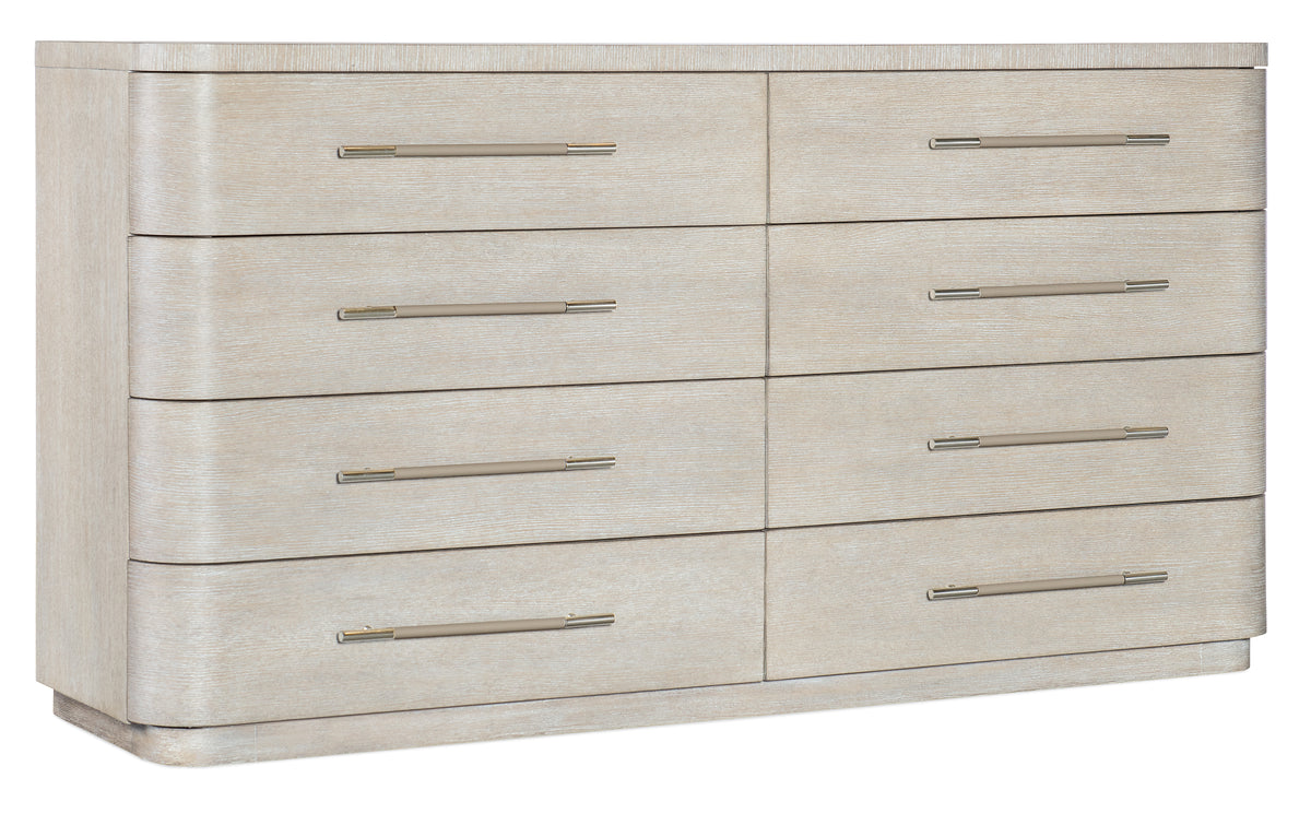 a white dresser with silver handles