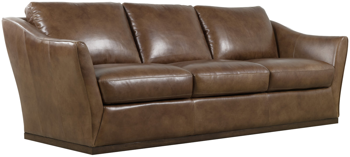 a brown leather couch with white background