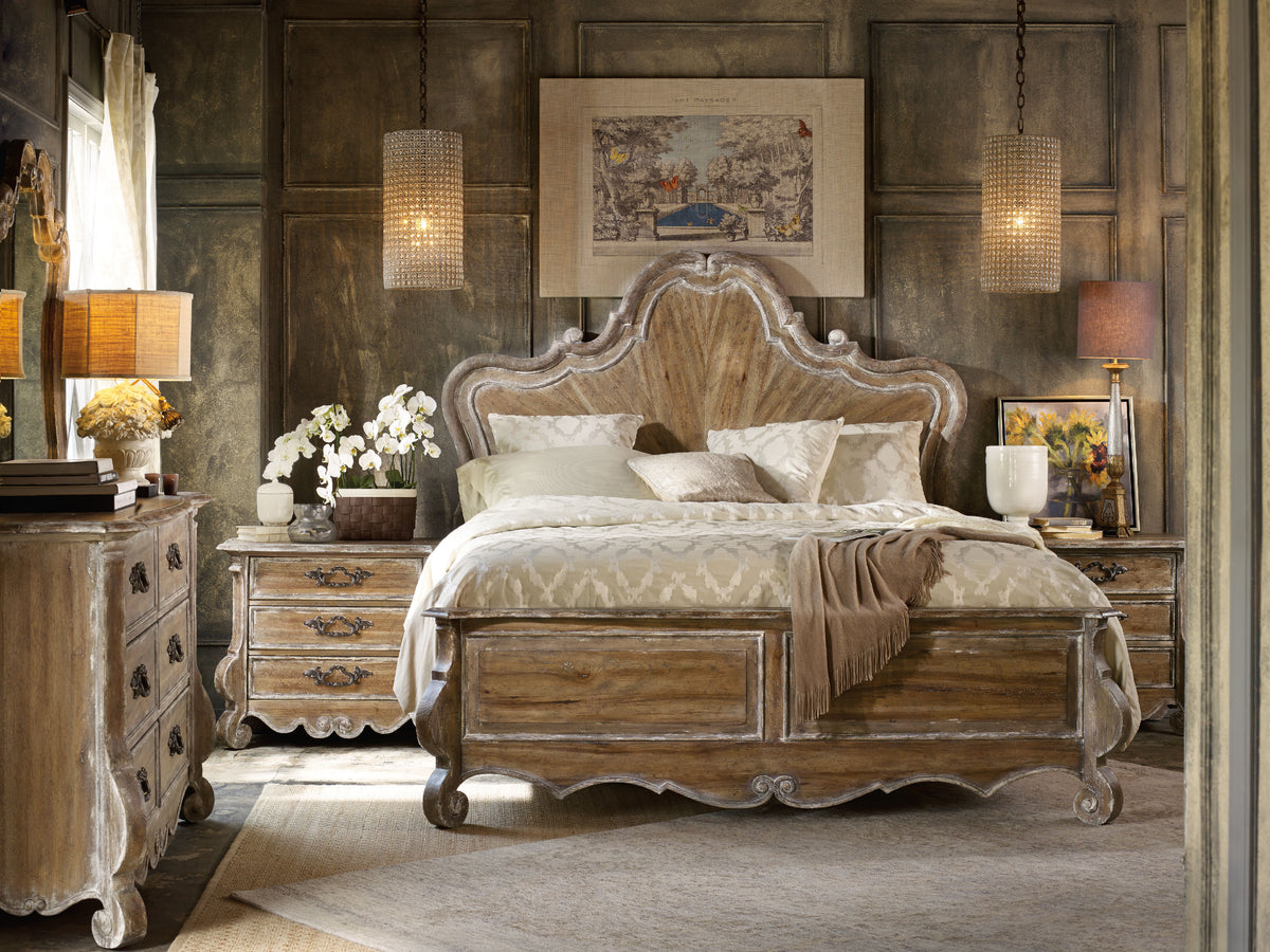 a bedroom with a bed and dresser