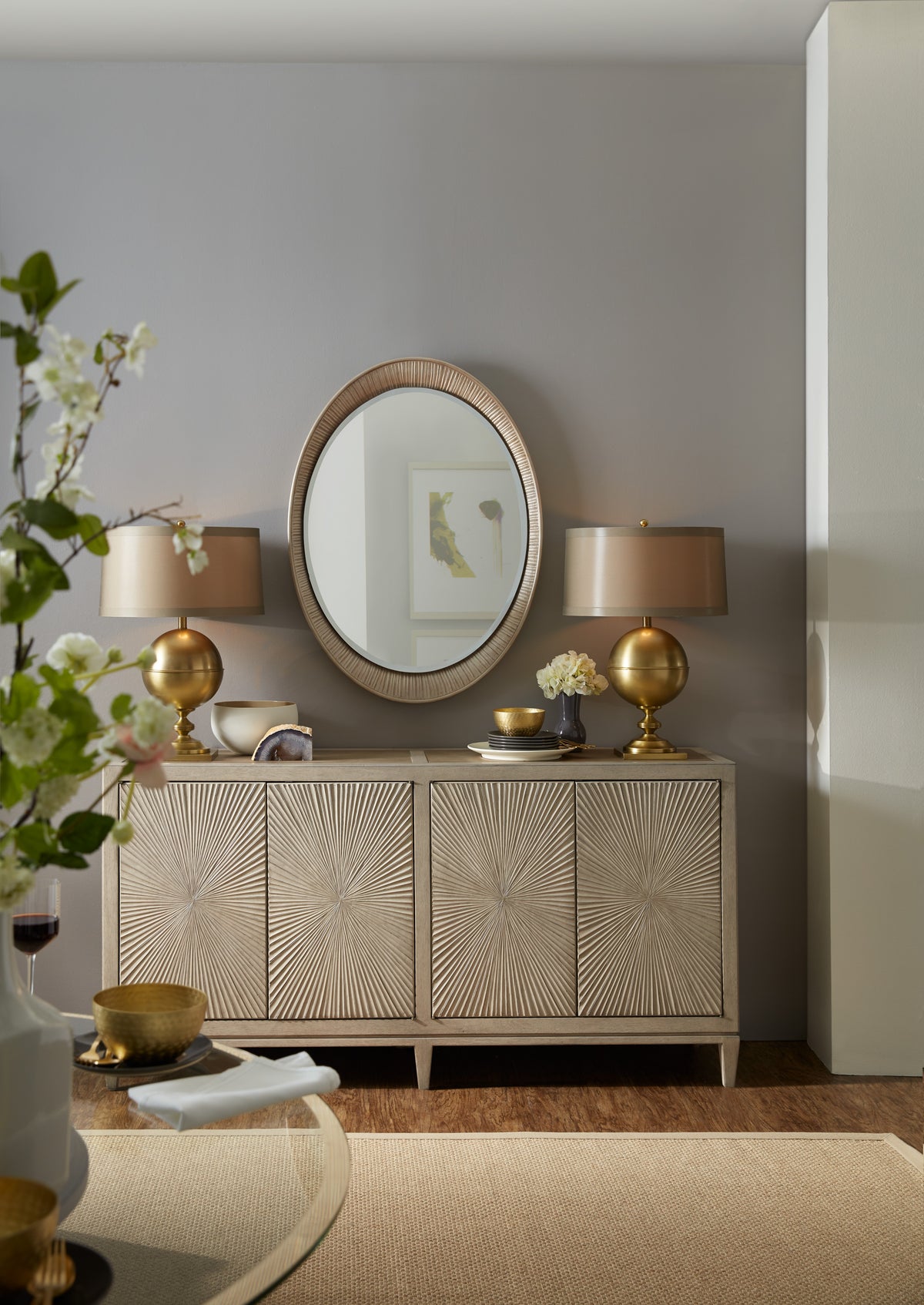 a mirror on a cabinet