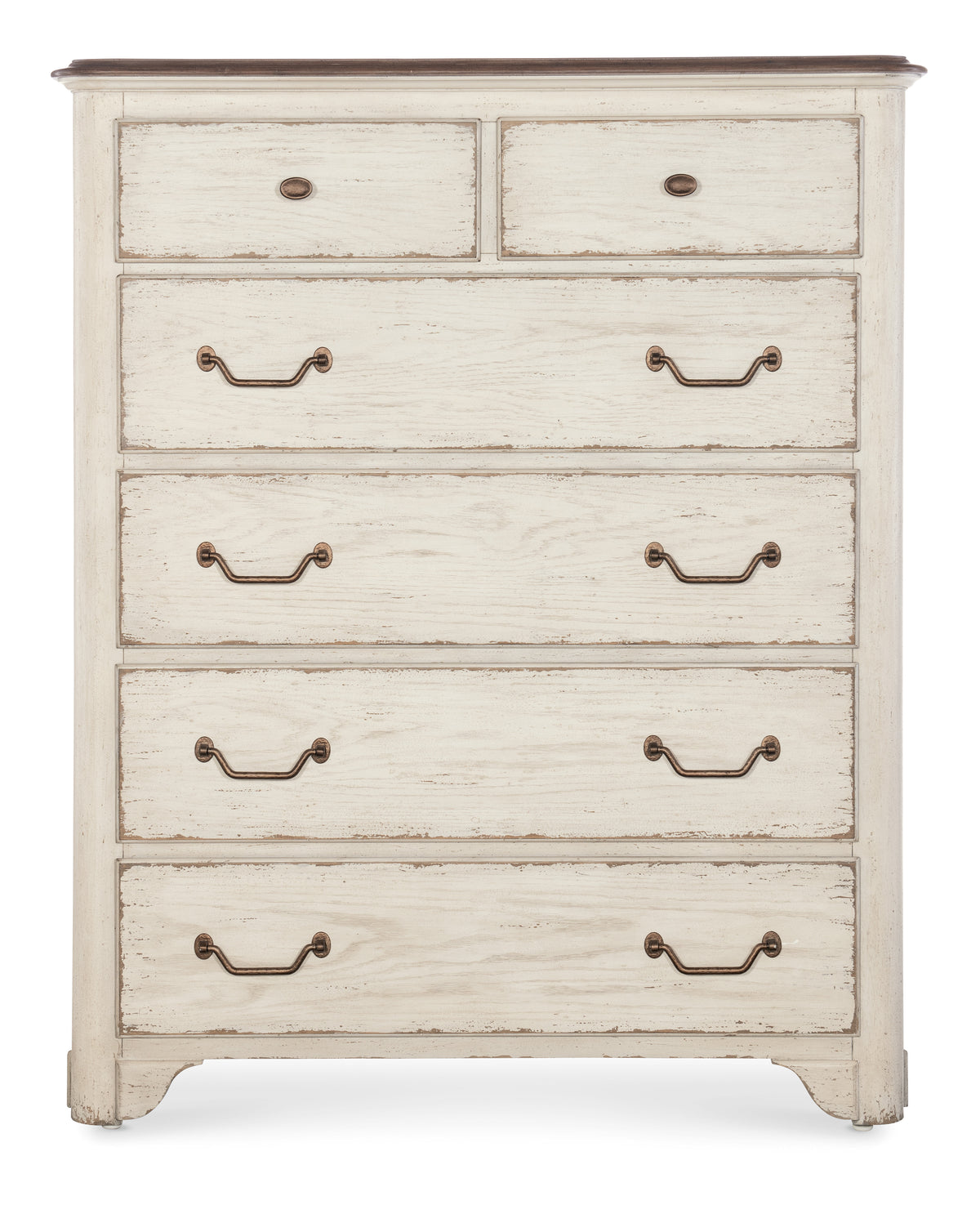 a white dresser with metal handles