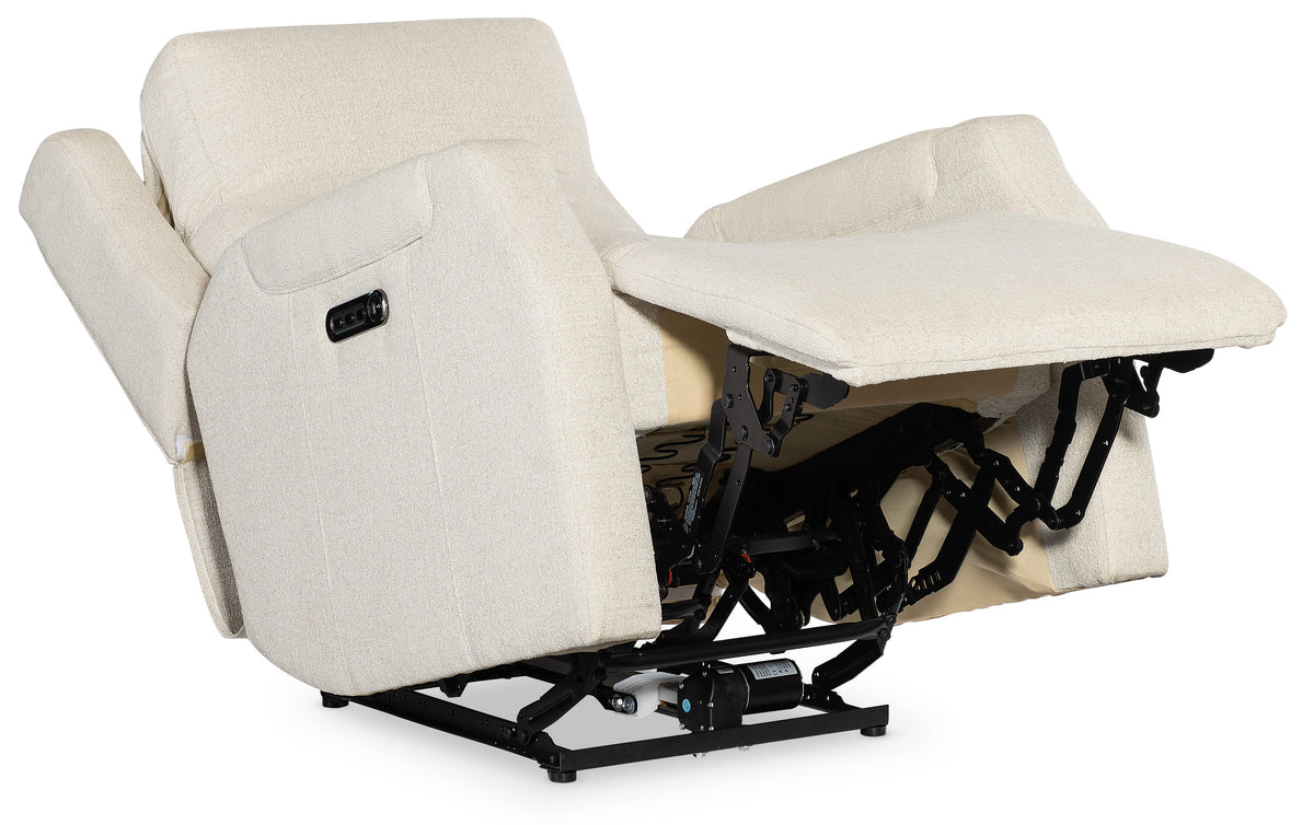 a white recliner with a black base