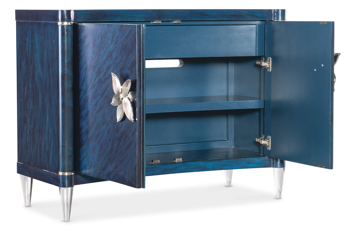 a blue cabinet with a silver butterfly handle