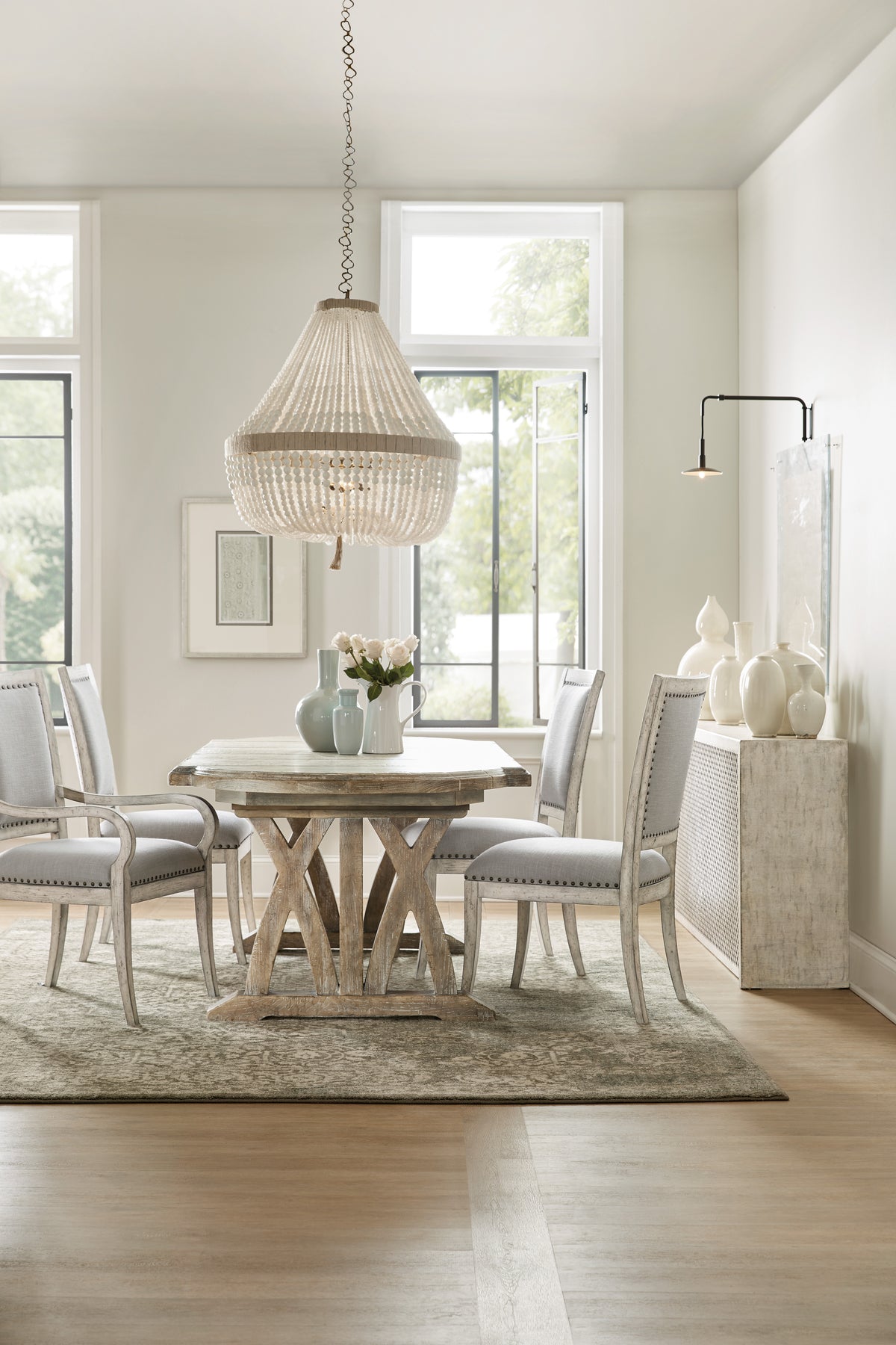 a dining room with a table and chairs