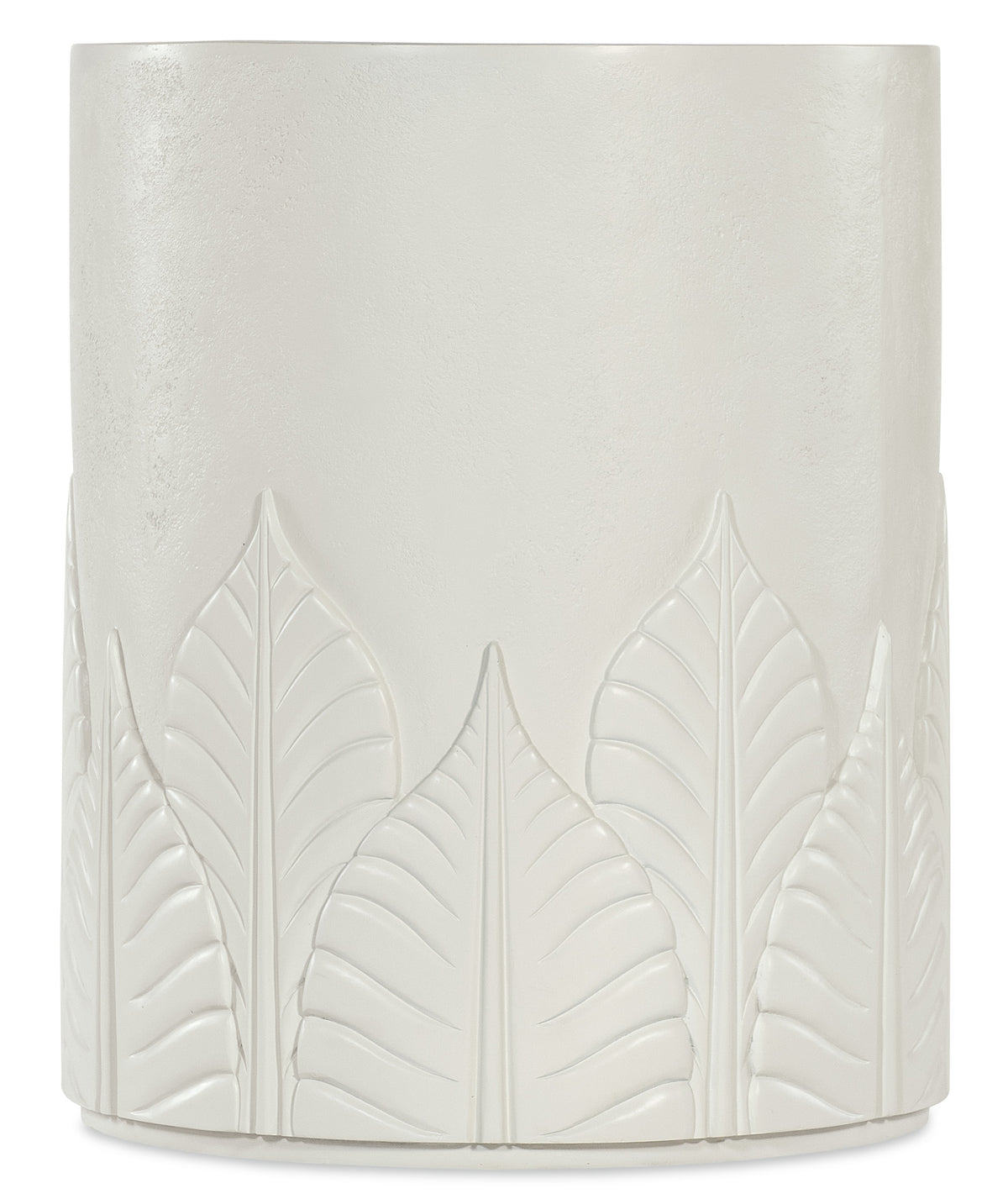 a white vase with leaves carved on it
