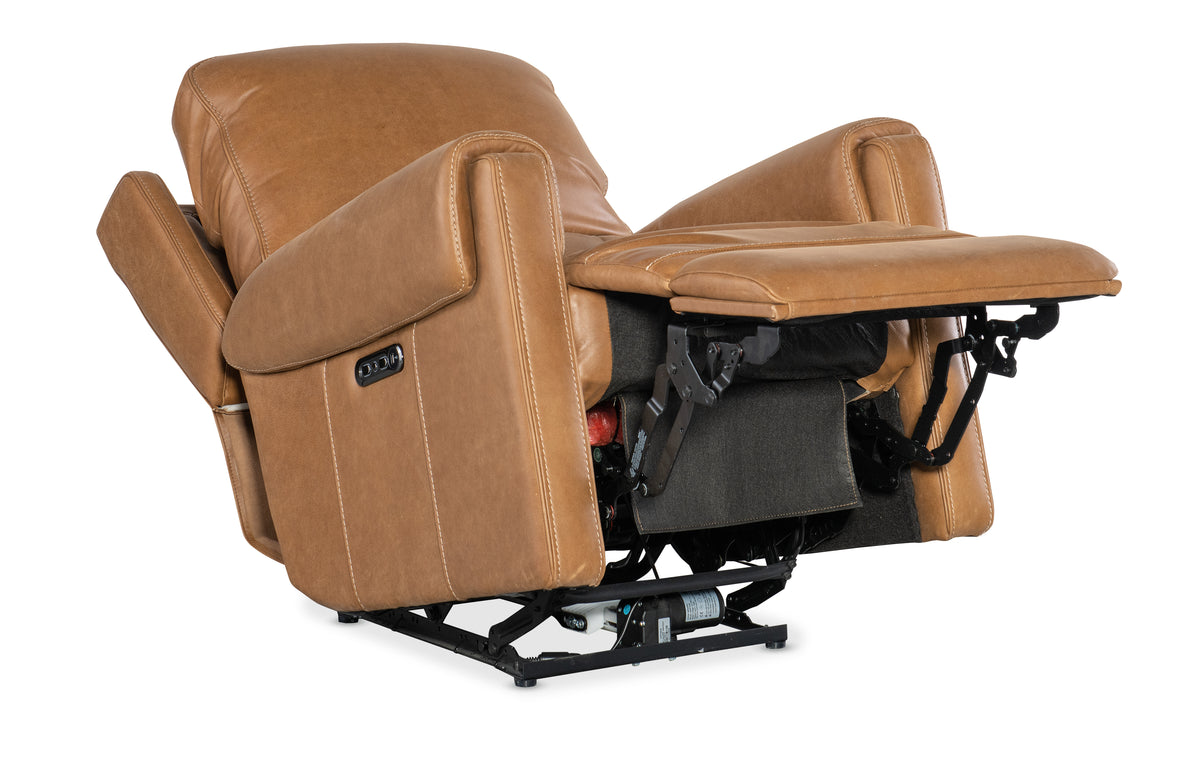 a brown recliner with a white background