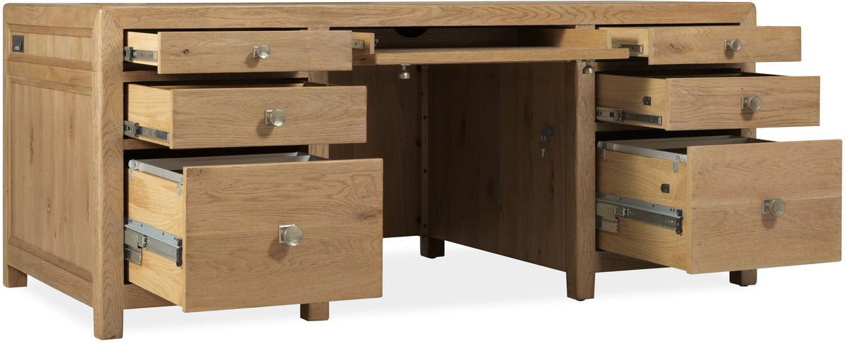 a wooden desk with drawers