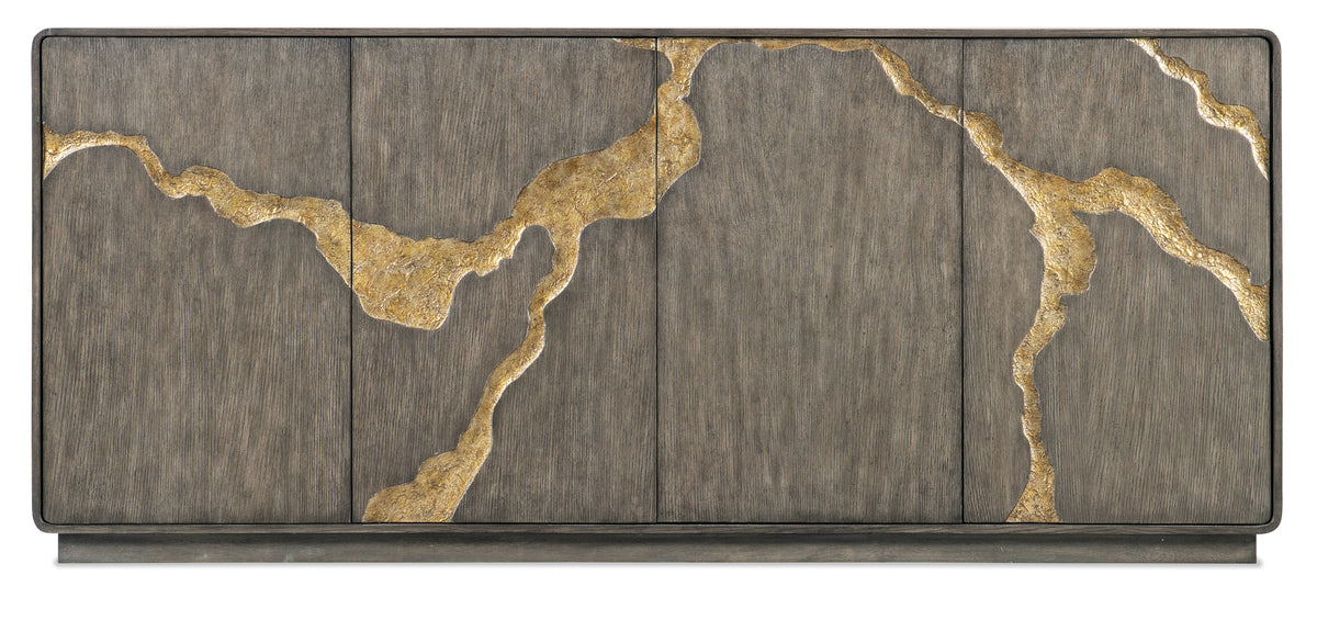 a wood panel with gold paint