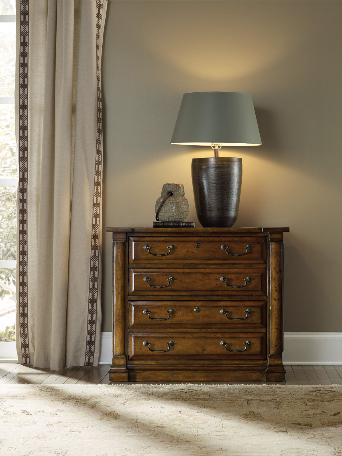 a lamp on a dresser
