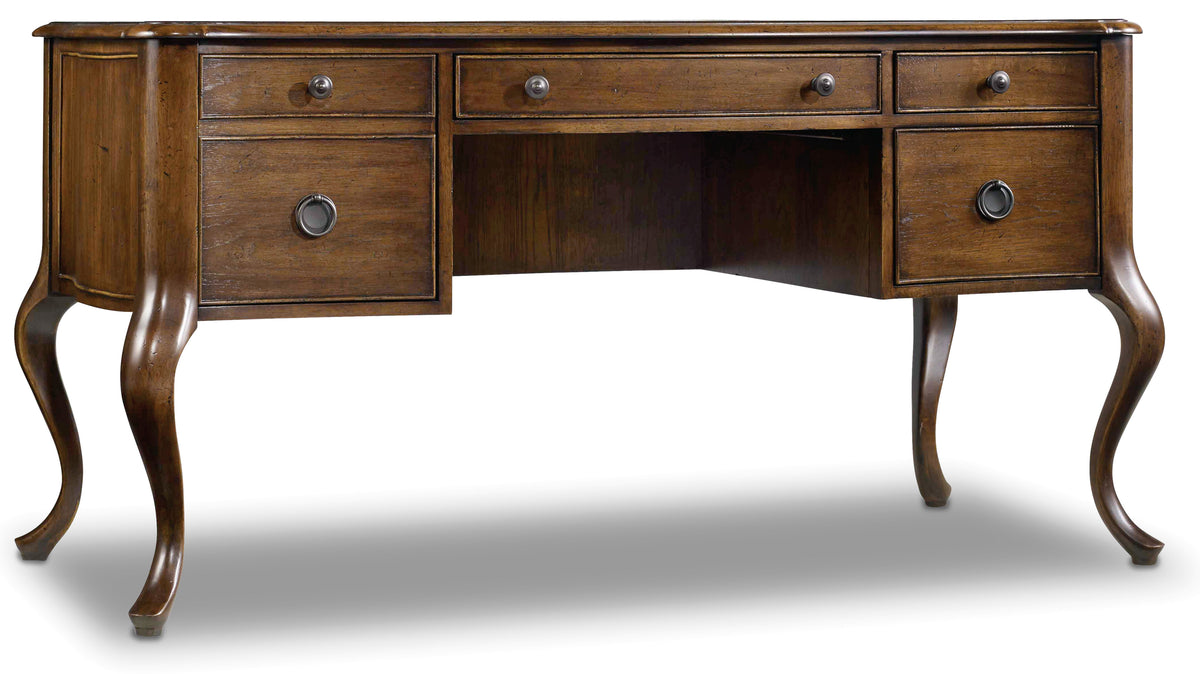 a wooden desk with drawers