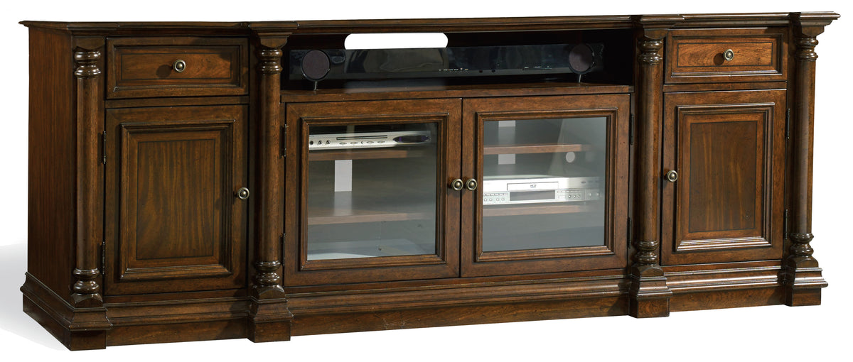 a wooden entertainment center with glass doors