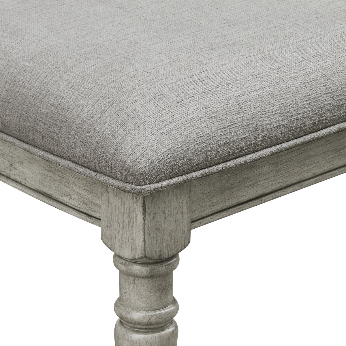 a close up of a grey cushion