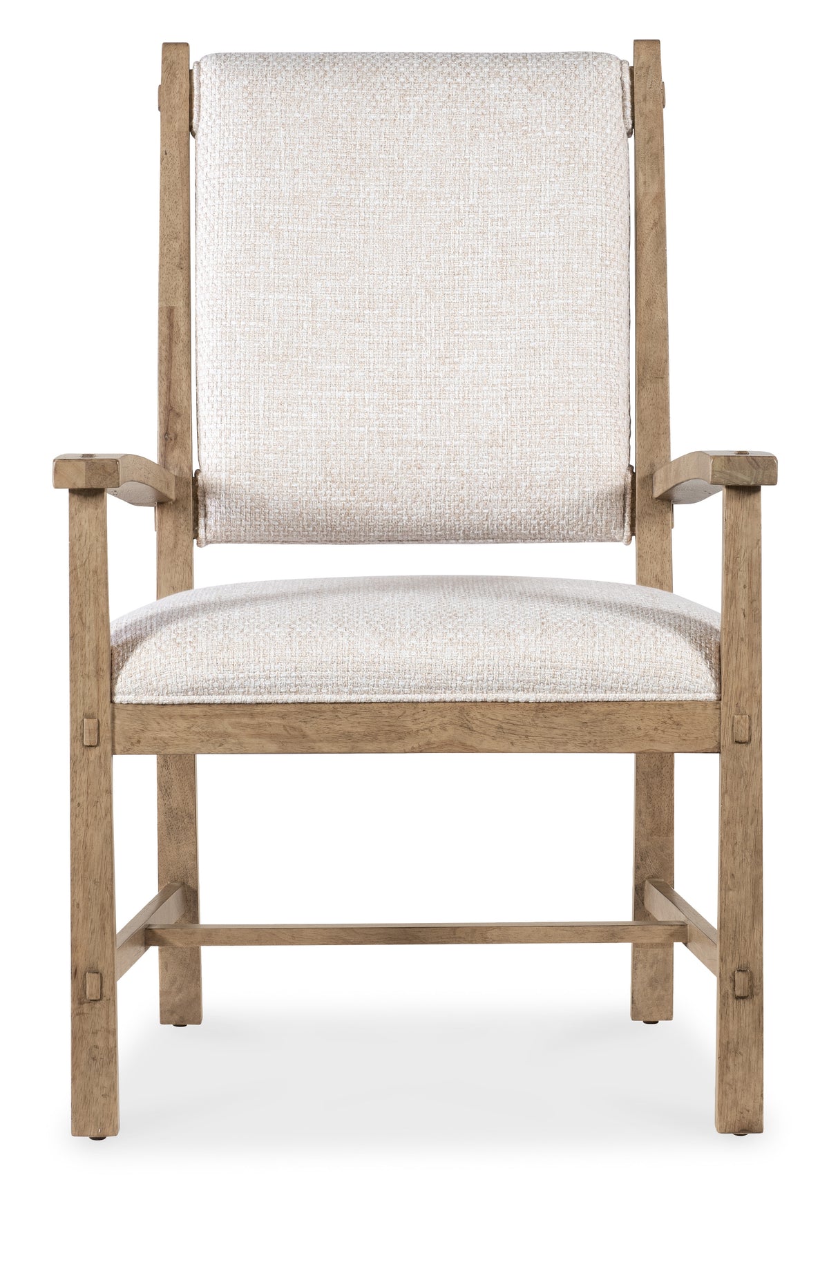 a wooden chair with a white cushion